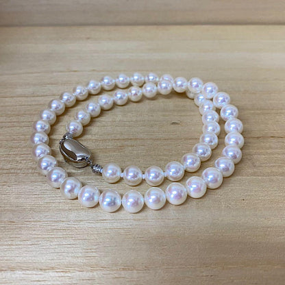 Akoya pearl necklace with 53 white uncolored pearls sized 7.5-8.0mm and silver one-touch clasp