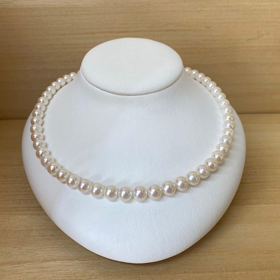 Akoya pearl necklace with 53 white uncolored pearls sized 7.5-8.0mm and silver one-touch clasp