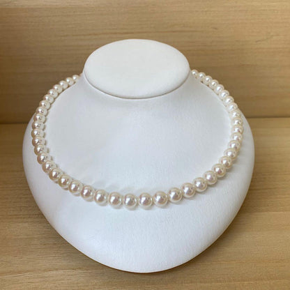 Akoya pearl necklace with 53 white uncolored pearls sized 7.5-8.0mm and silver one-touch clasp
