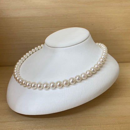 Akoya pearl necklace with 53 white uncolored pearls sized 7.5-8.0mm and silver one-touch clasp