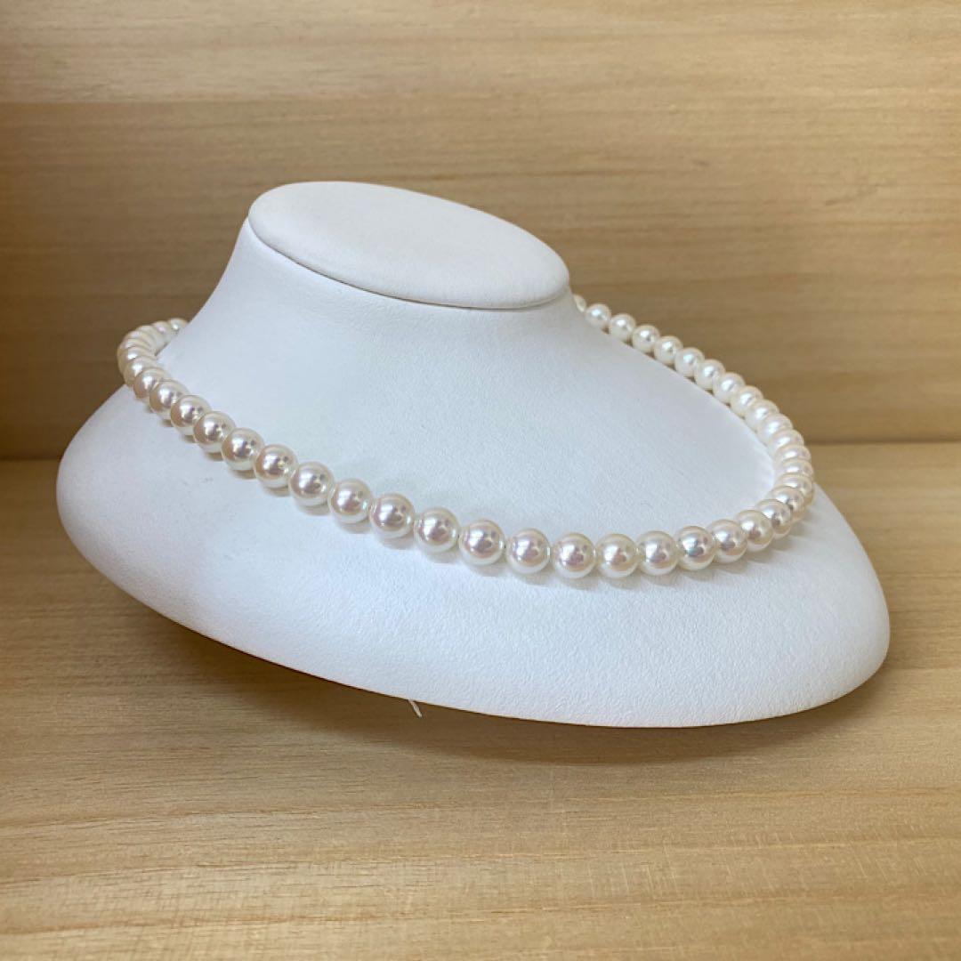 Akoya pearl necklace with 53 white uncolored pearls sized 7.5-8.0mm and silver one-touch clasp