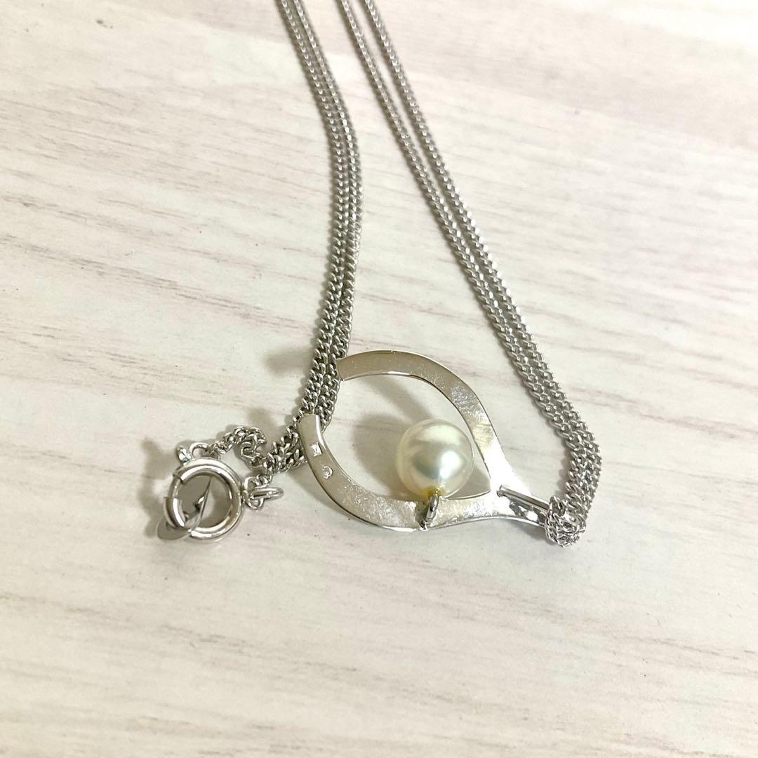 Mikimoto Akoya Pearl Pendant Necklace with silver chain and single 7mm pearl on white background