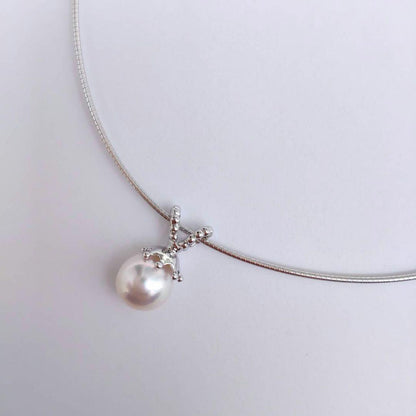 Akoya pearl necklace with 8mm pearls on silver omega chain approximately 45cm long with silver clasp