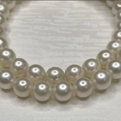 Akoya pearl necklace with 7.1-7.6mm round white pearls and silver clasp, 43cm length