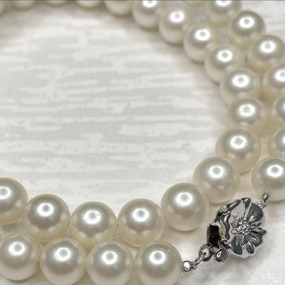 Akoya pearl necklace with 7.1-7.6mm round white pearls and silver clasp, 43cm length
