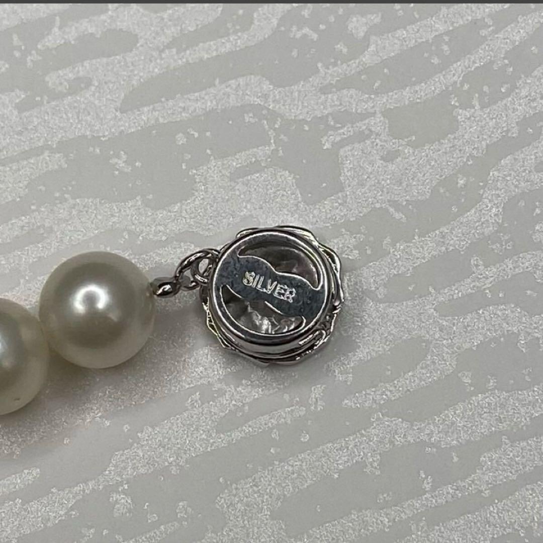 Akoya pearl necklace with 7.1-7.6mm round white pearls and silver clasp, 43cm length