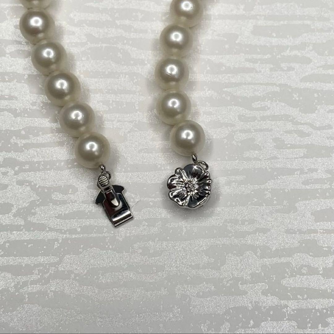 Akoya pearl necklace with 7.1-7.6mm round white pearls and silver clasp, 43cm length