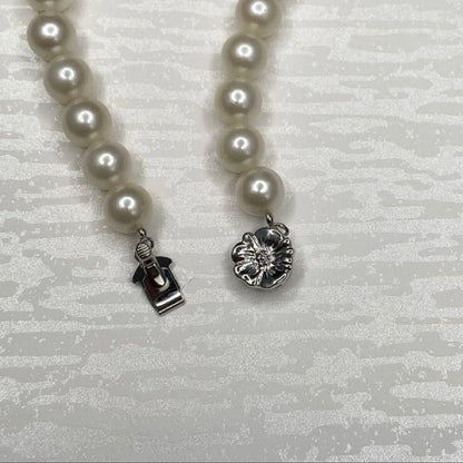 Akoya pearl necklace with 7.1-7.6mm round white pearls and silver clasp, 43cm length