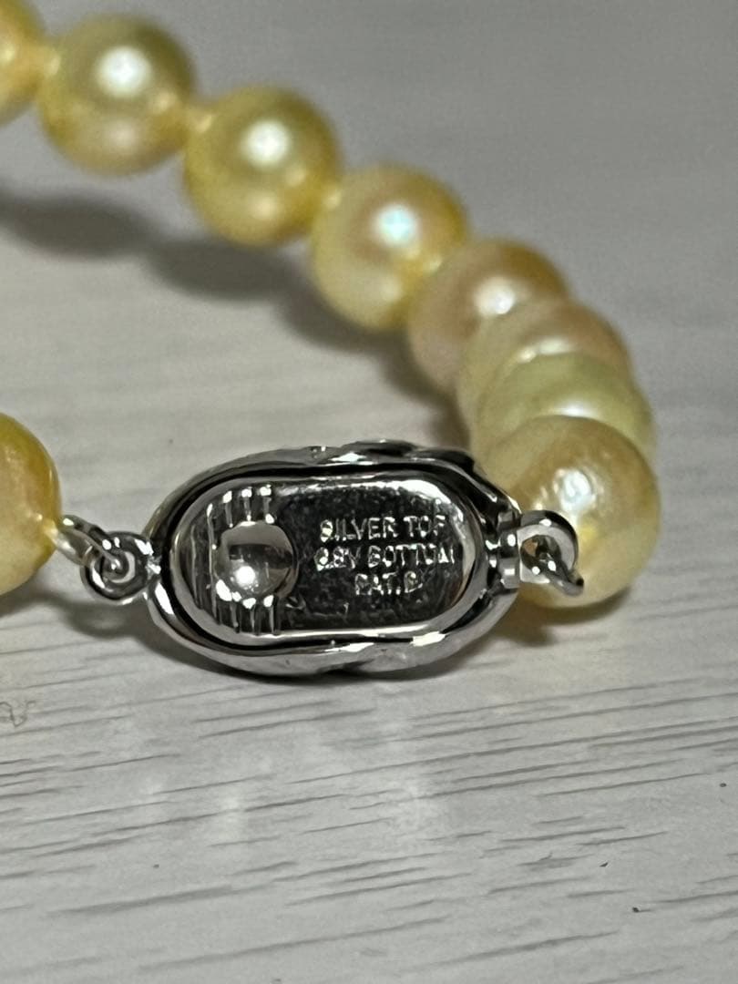 Akoya pearl necklace featuring 7mm pearls with a total length of 43cm displayed on a white background