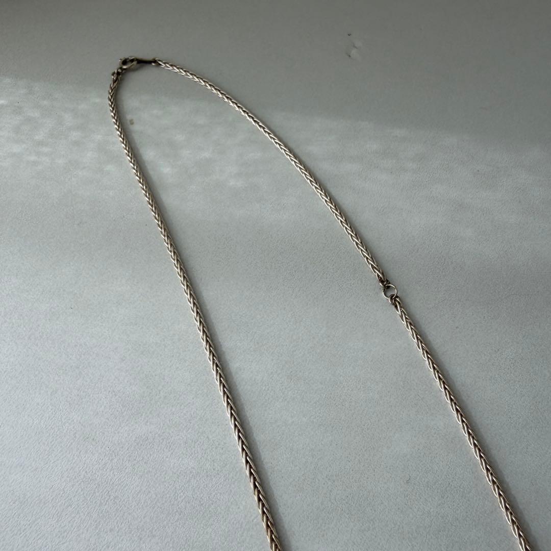 Agete silver necklace chain 70cm length displayed on white background