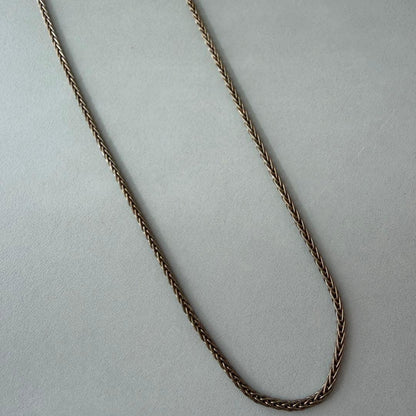 Agete silver necklace chain 70cm length displayed on white background