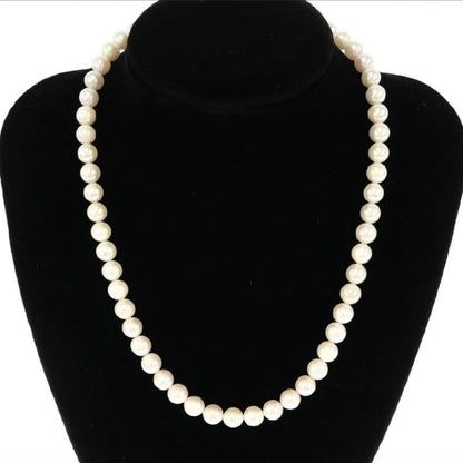 Akoya pearl necklace with 7.0-7.5mm round pearls and certificate displayed
