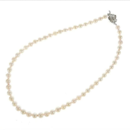 Akoya pearl necklace with 7.0-7.5mm round pearls and certificate displayed