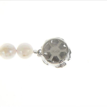 Akoya pearl necklace with 7.0-7.5mm round pearls and certificate displayed