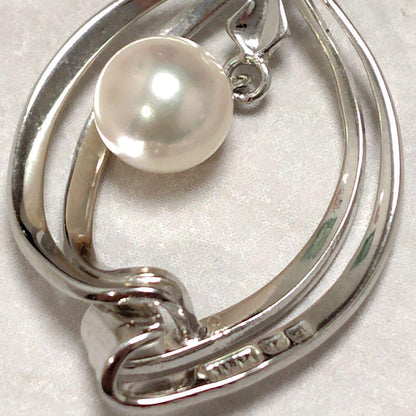 Mikimoto genuine pearl pendant necklace with a 0.6 cm pearl on a 40 cm chain and bonus metal necklace