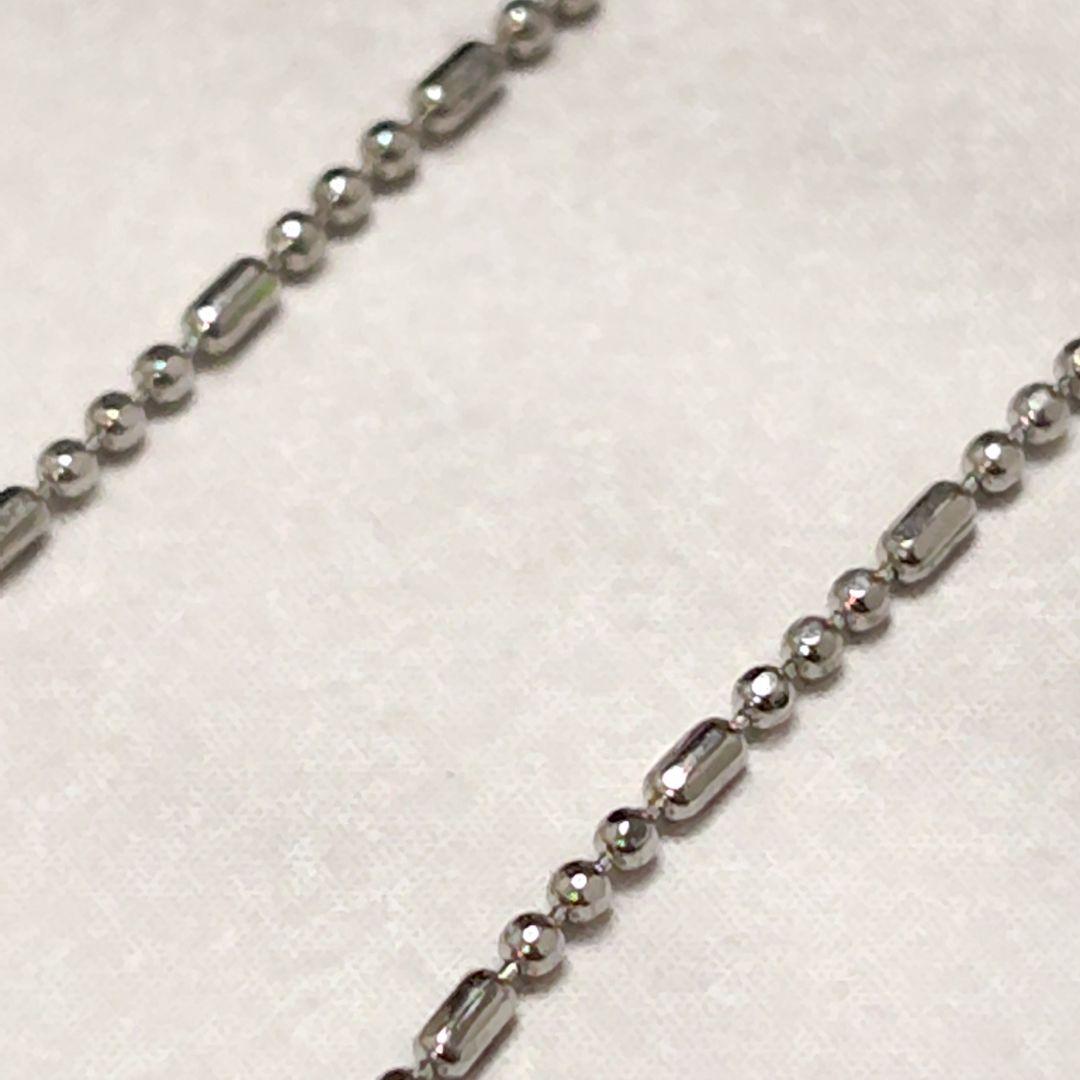 Mikimoto genuine pearl pendant necklace with a 0.6 cm pearl on a 40 cm chain and bonus metal necklace