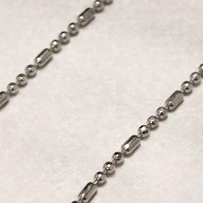 Mikimoto genuine pearl pendant necklace with a 0.6 cm pearl on a 40 cm chain and bonus metal necklace