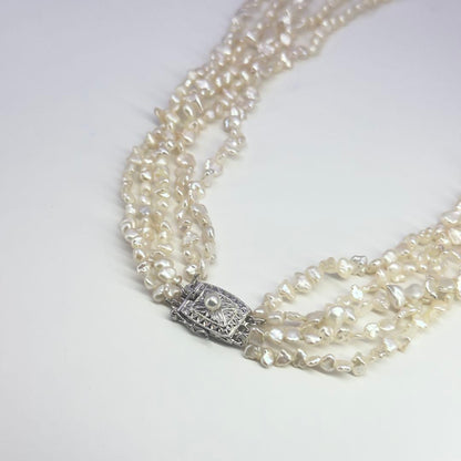Tasaki SV Baroque Pearl 5-Row Necklace approximately 58cm long displayed on a white background