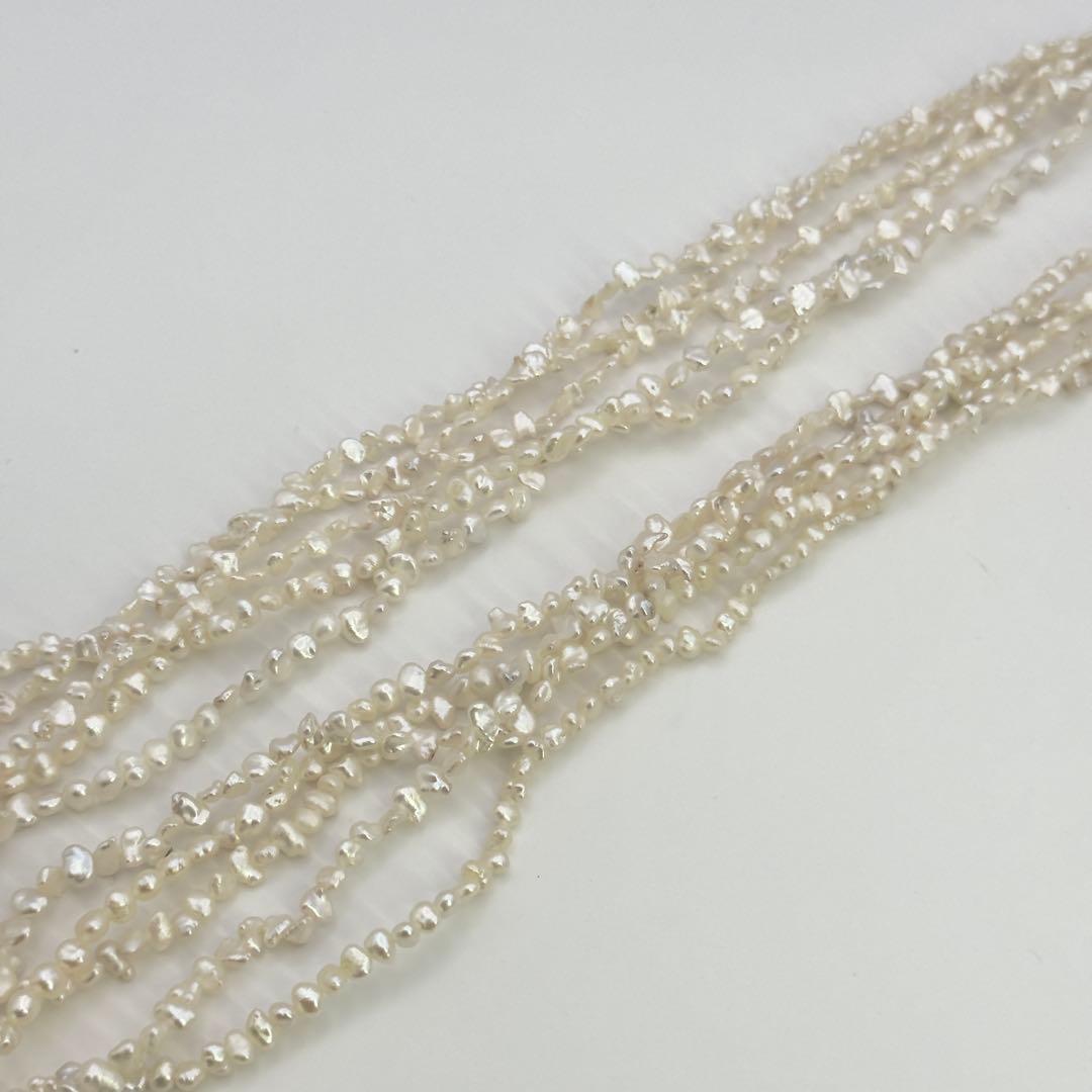 Tasaki SV Baroque Pearl 5-Row Necklace approximately 58cm long displayed on a white background