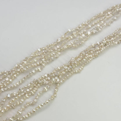 Tasaki SV Baroque Pearl 5-Row Necklace approximately 58cm long displayed on a white background