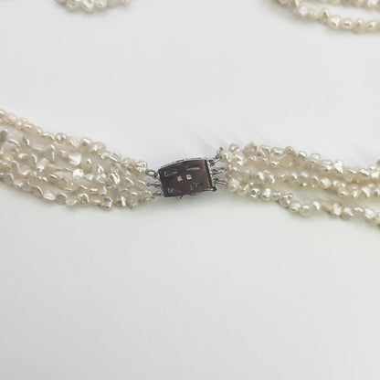 Tasaki SV Baroque Pearl 5-Row Necklace approximately 58cm long displayed on a white background