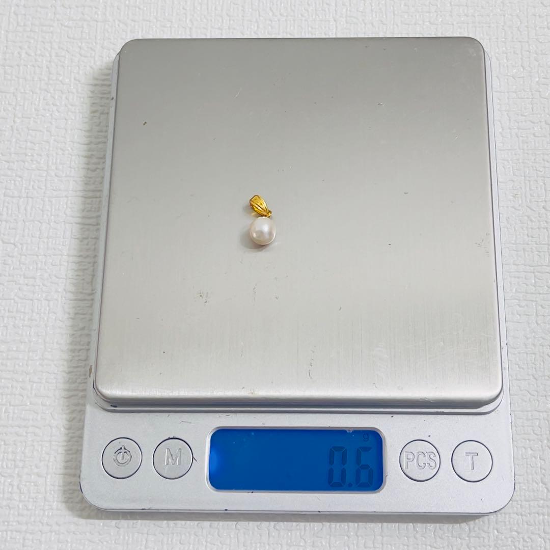Akoya Pearl pendant top made of K18 gold with a single round Akoya pearl and tanaka markings