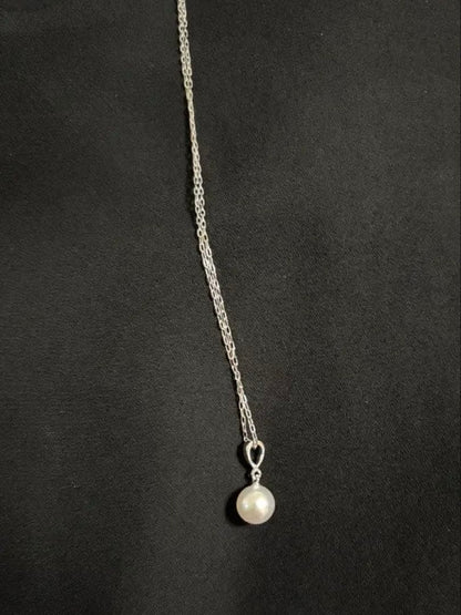 Mikimoto 7.6mm white Akoya pearl pendant in 18K white gold with little bean chain and box
