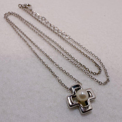 Tasaki silver cross necklace featuring a single pearl pendant on an adjustable metal chain length 39 to 42.5 cm