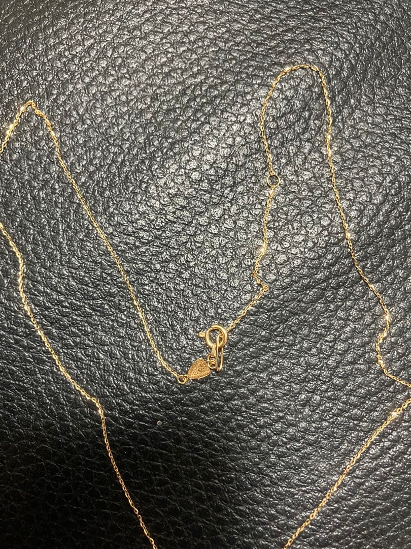 18k gold chain necklace by agete, gently used with a sleek and elegant design
