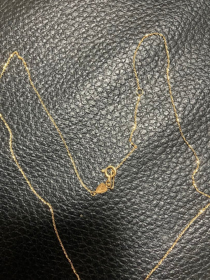 18k gold chain necklace by agete, gently used with a sleek and elegant design