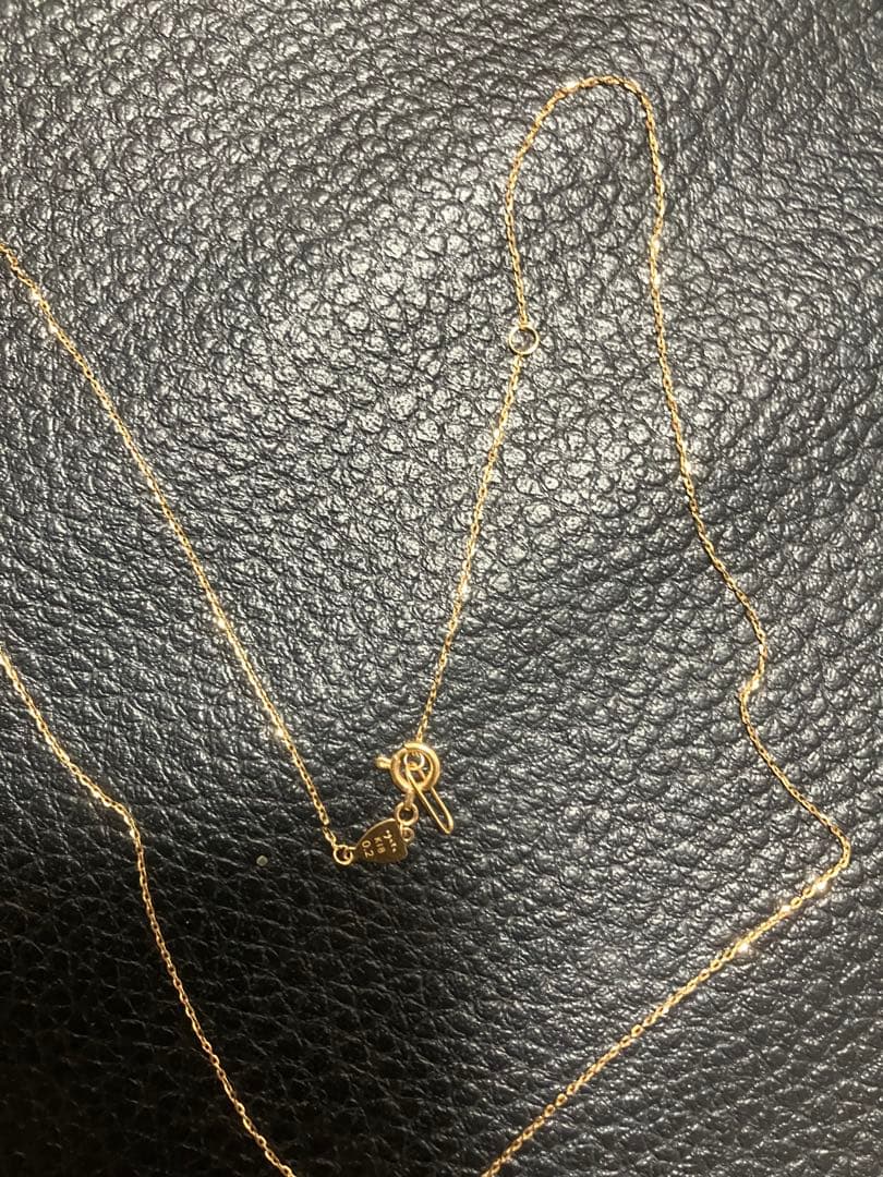 18k gold chain necklace by agete, gently used with a sleek and elegant design
