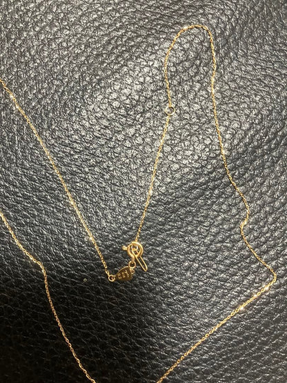 18k gold chain necklace by agete, gently used with a sleek and elegant design
