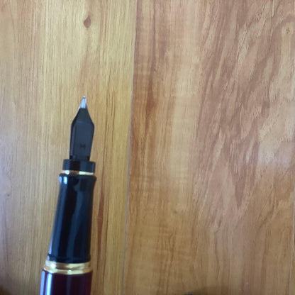 Waterman fountain pen and ballpoint pen set displayed in a brown leather case