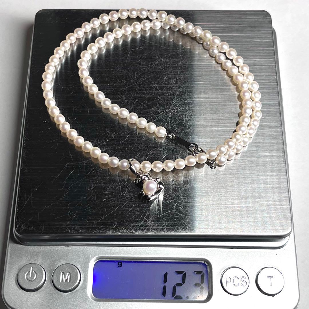 Tasaki Bear Charm Pearl Necklace with silver hallmark, 43 cm length, displayed on a white background