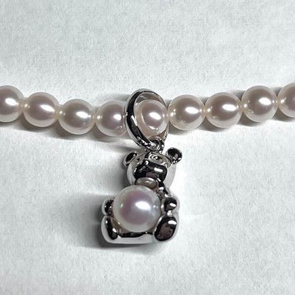 Tasaki Bear Charm Pearl Necklace with silver hallmark, 43 cm length, displayed on a white background