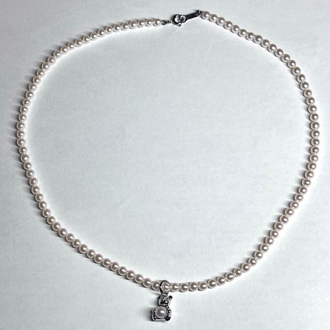 Tasaki Bear Charm Pearl Necklace with silver hallmark, 43 cm length, displayed on a white background
