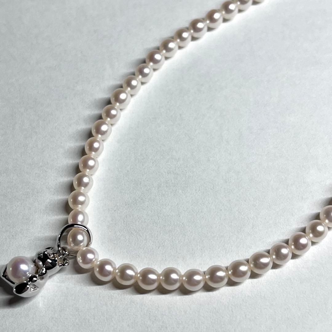 Tasaki Bear Charm Pearl Necklace with silver hallmark, 43 cm length, displayed on a white background