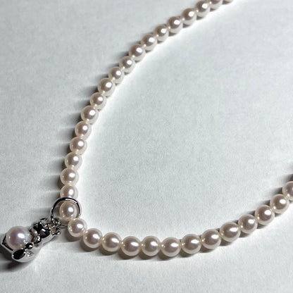 Tasaki Bear Charm Pearl Necklace with silver hallmark, 43 cm length, displayed on a white background