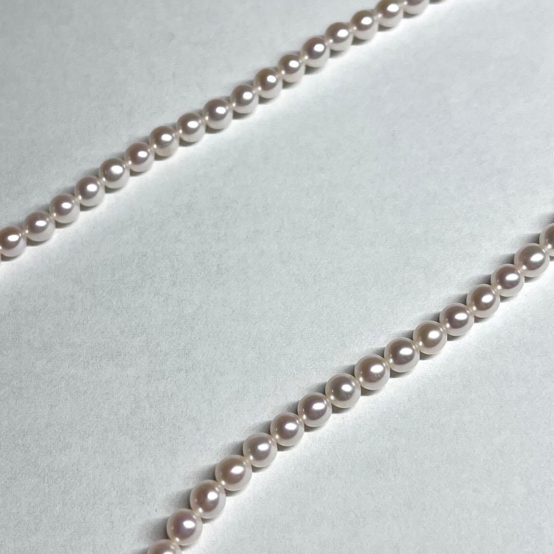 Tasaki Bear Charm Pearl Necklace with silver hallmark, 43 cm length, displayed on a white background