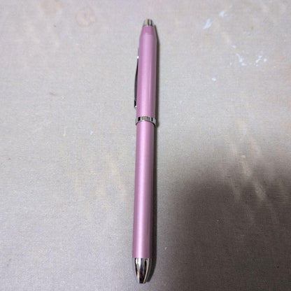 Cross multifunction pen in pink with sharp pencil and ballpoint features shown on white background