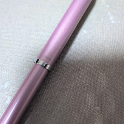 Cross multifunction pen in pink with sharp pencil and ballpoint features shown on white background