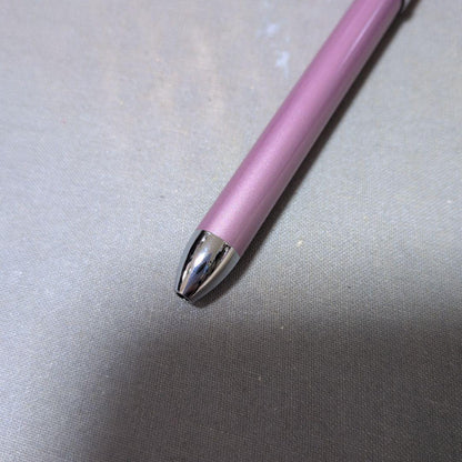 Cross multifunction pen in pink with sharp pencil and ballpoint features shown on white background