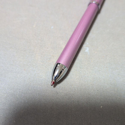 Cross multifunction pen in pink with sharp pencil and ballpoint features shown on white background