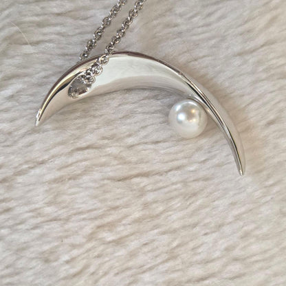 Mikimoto Crescent Moon Pearl Necklace in silver with 0.7cm pearl and adjustable sterling silver chain
