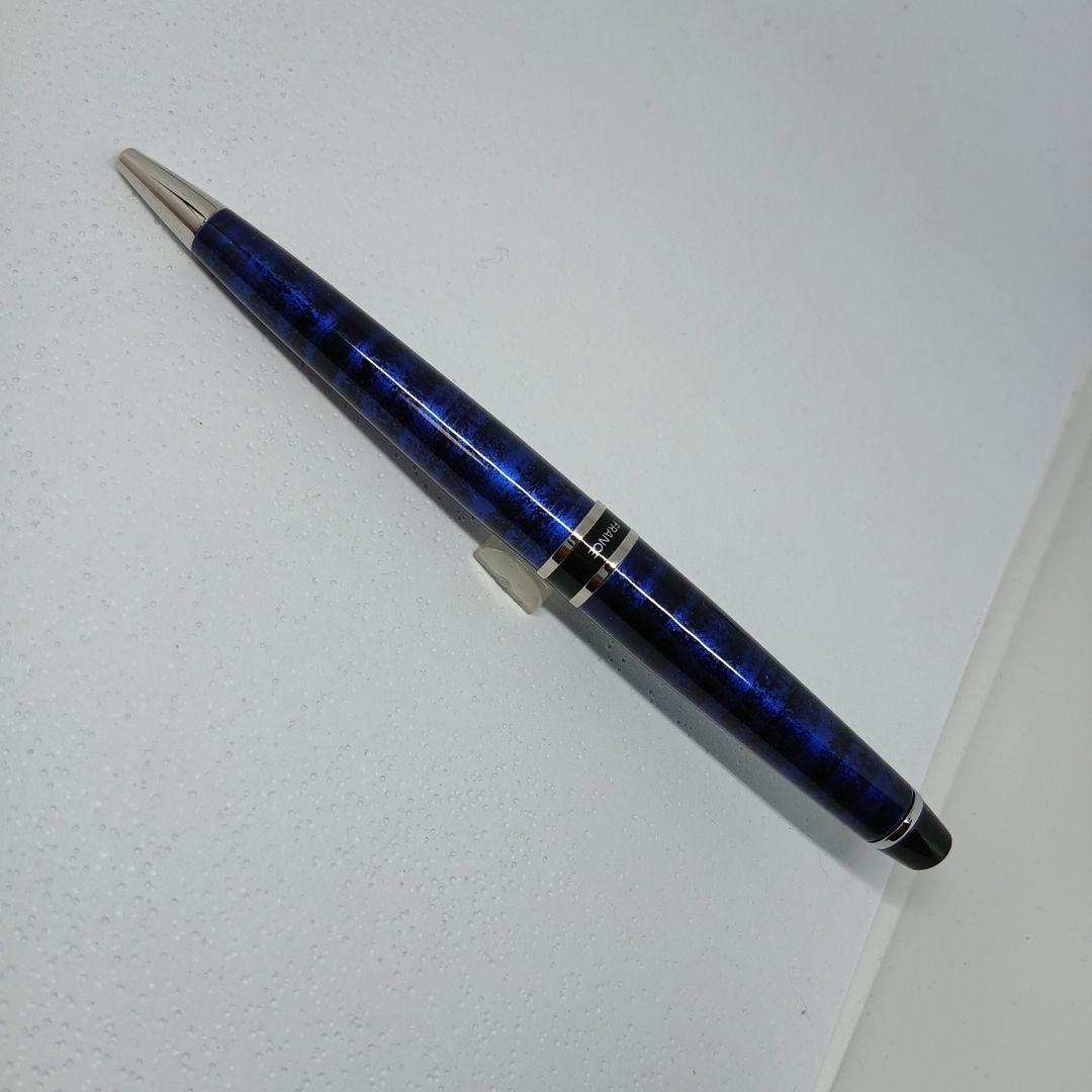 WATERMAN Expert Blue Marble ballpoint pen in blue metal with stripe pattern shown with box and manual