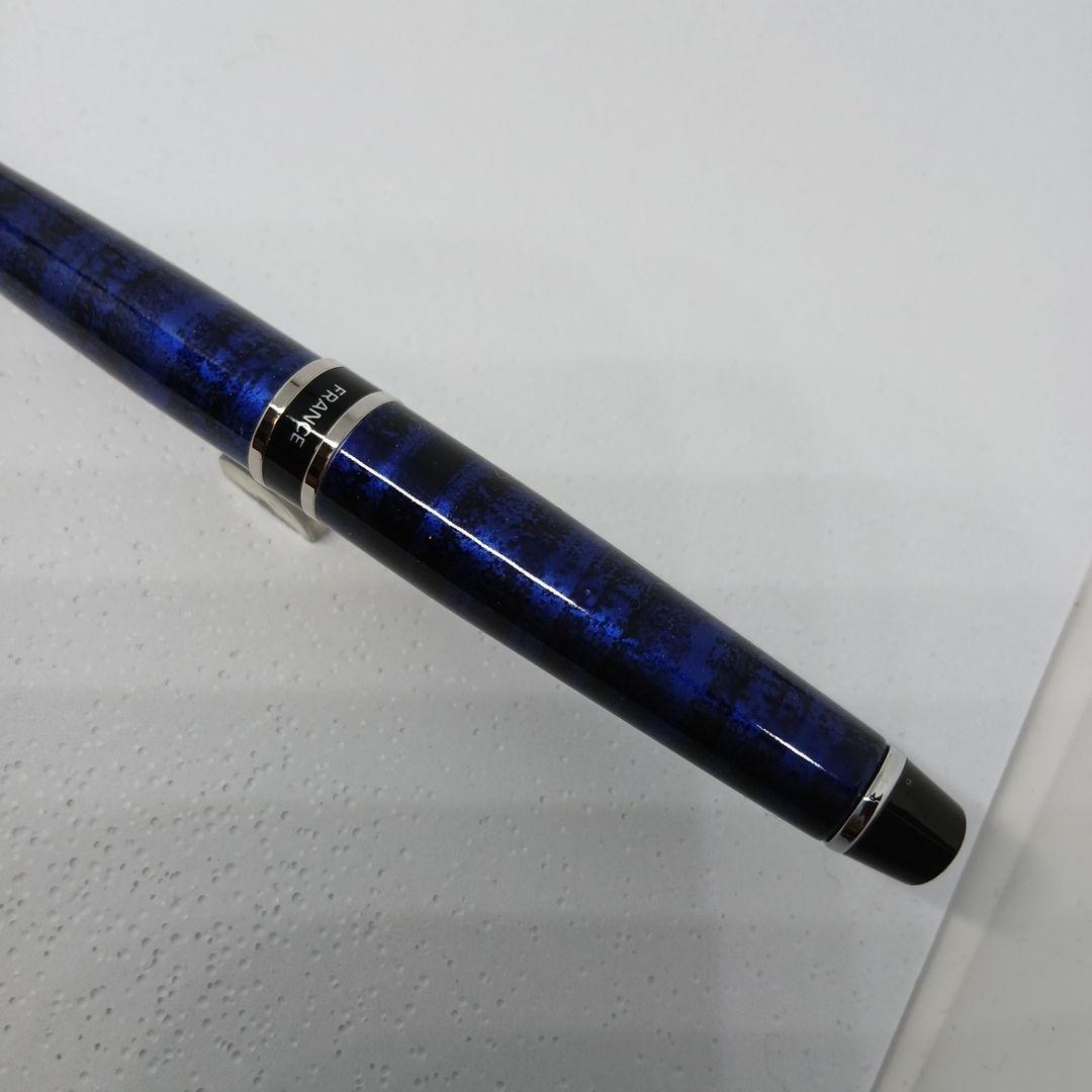 WATERMAN Expert Blue Marble ballpoint pen in blue metal with stripe pattern shown with box and manual