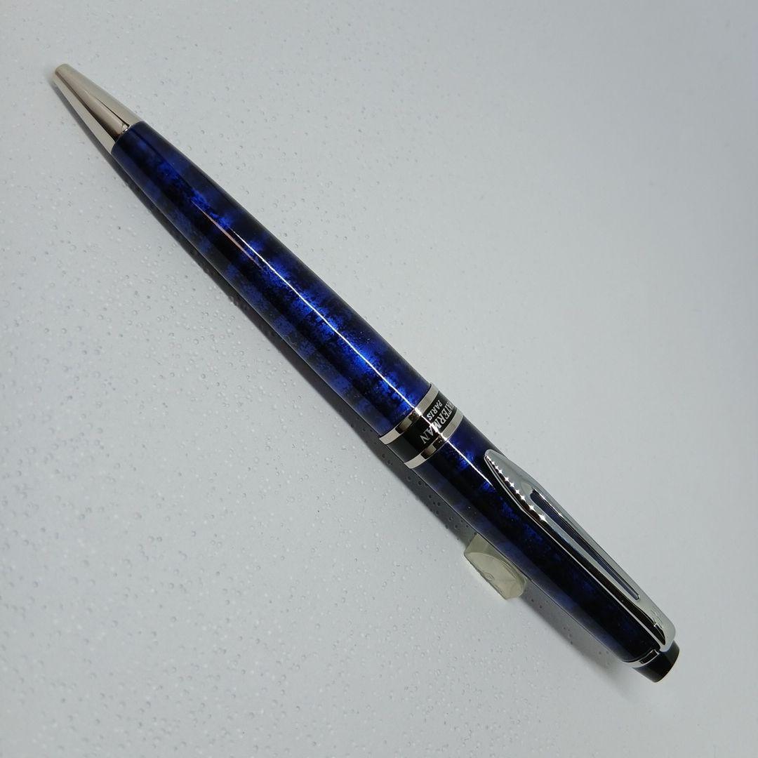 WATERMAN Expert Blue Marble ballpoint pen in blue metal with stripe pattern shown with box and manual