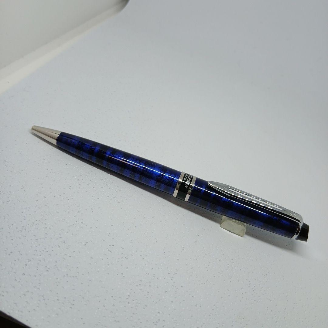 WATERMAN Expert Blue Marble ballpoint pen in blue metal with stripe pattern shown with box and manual