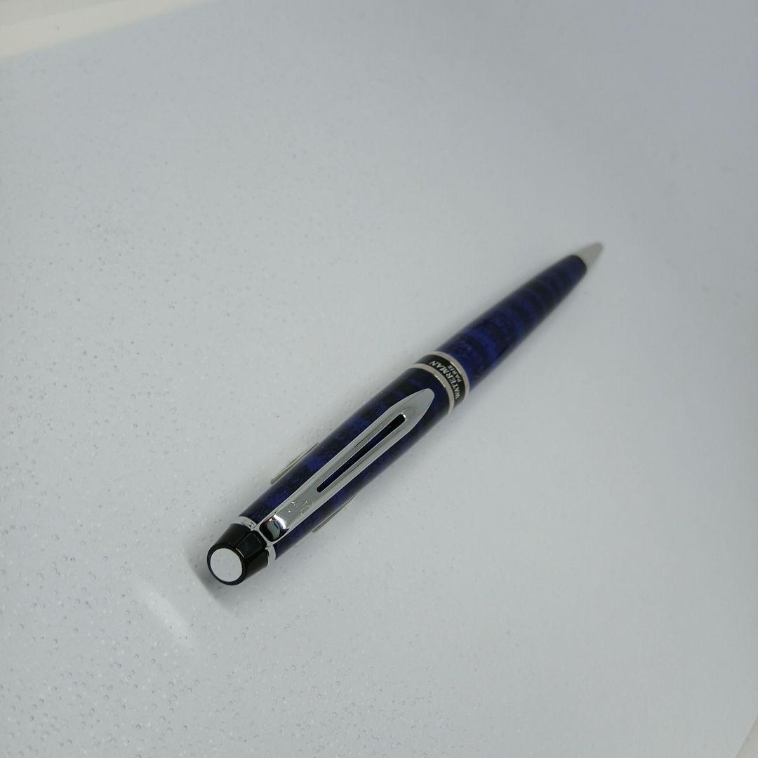 WATERMAN Expert Blue Marble ballpoint pen in blue metal with stripe pattern shown with box and manual