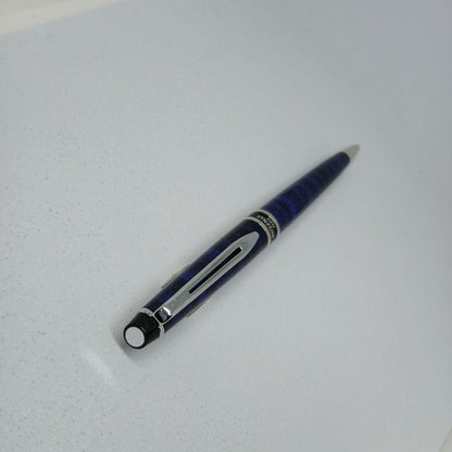 WATERMAN Expert Blue Marble ballpoint pen in blue metal with stripe pattern shown with box and manual